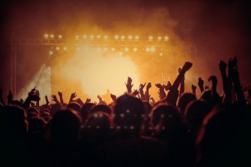 A backlit crowd at a concert